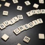 How Installment Loans May Help Rebuild Credit Before the New Year 2 Tile letters spelling out “Build Your Credit”